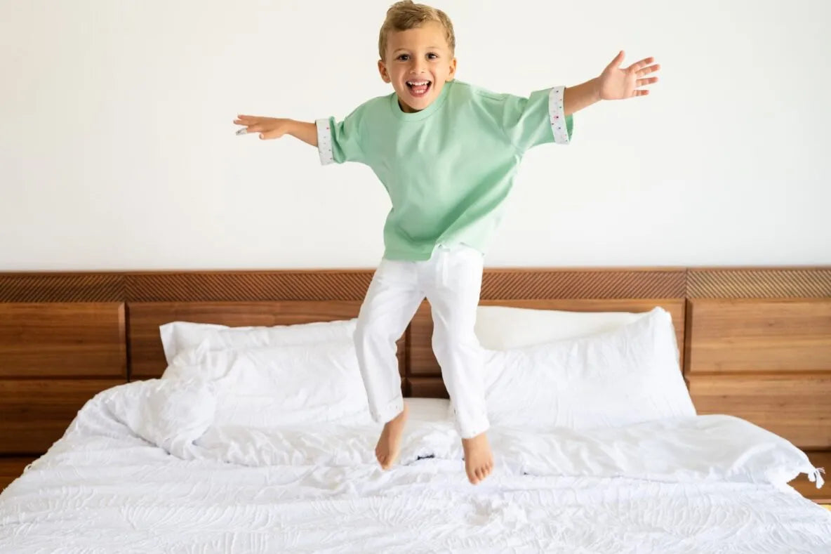 Child in green outfit